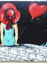 Close-up of red object on wall