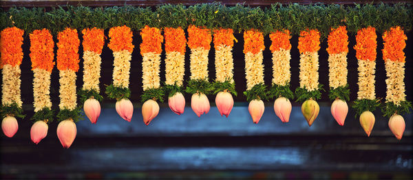 Colorful floral garlands hanging at door