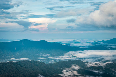 Aerial view of majestic mountains against sky