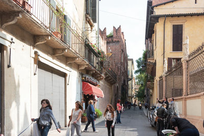 People walking on street in city