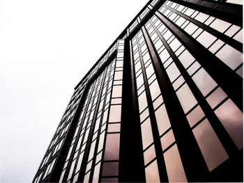 Low angle view of modern building against clear sky