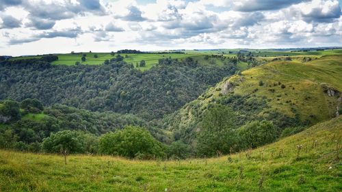 Scenic view of land against sky