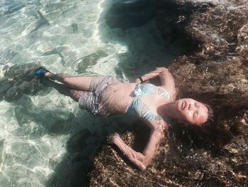 High angle view of man swimming in sea