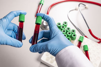 Close-up of hand holding paper