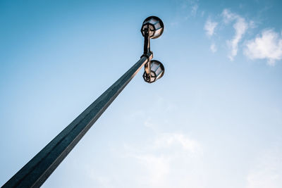 Low angle view of street light against sky