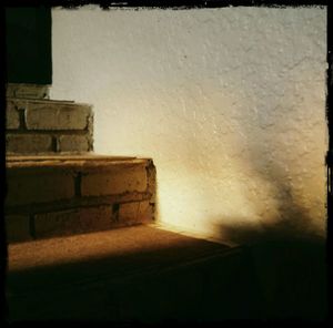 Built structure against wall
