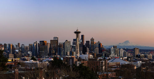 Modern buildings in city against sky