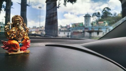 Ganesha idol on car dashboard