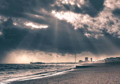 Scenic view of sea against dramatic sky