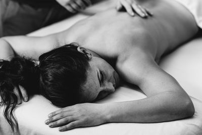 Relax massage for shoulders and neck, hands of a massage therapist massaging shoulder of a female 