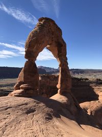 Rock formation on land against sky