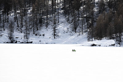 Scenic view of snowcapped mountains during winter