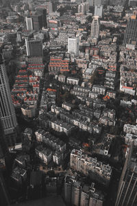 High angle view of illuminated buildings in city