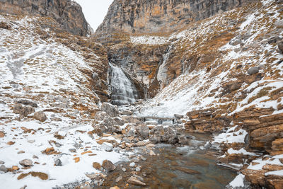 Scenic view of snowcapped mountains during winter