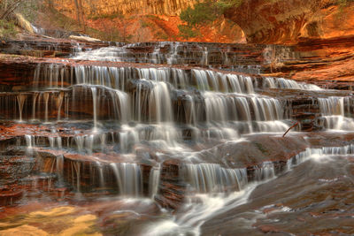 Scenic view of waterfall in forest