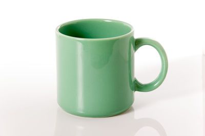 Close-up of coffee cup on table