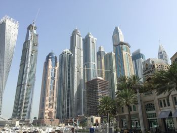 Low angle view of buildings against clear sky