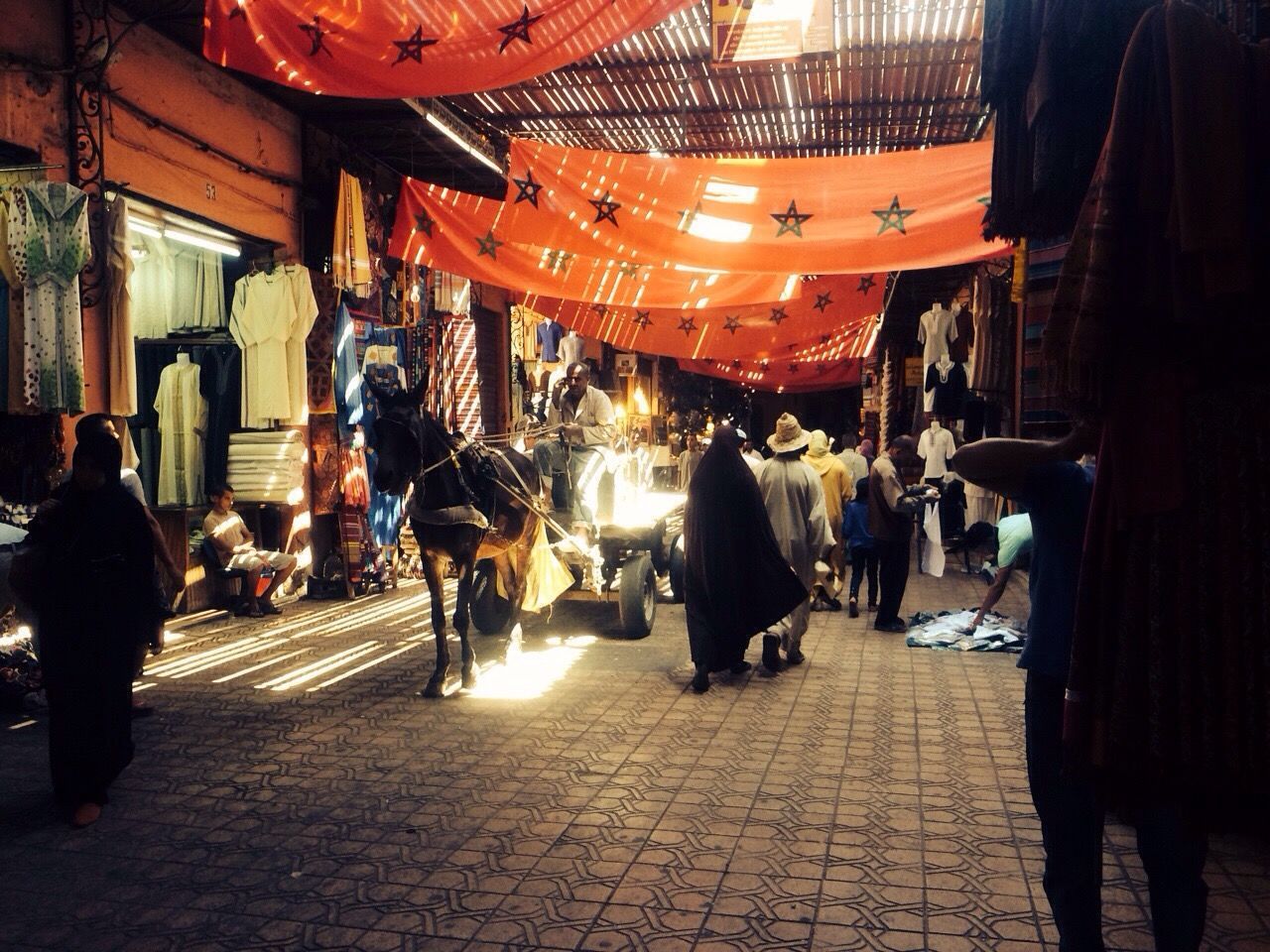 large group of people, men, person, architecture, building exterior, built structure, lifestyles, street, walking, city life, city, illuminated, market, leisure activity, medium group of people, mixed age range, market stall, crowd, night