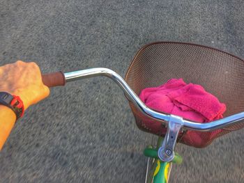 Close-up of hand holding umbrella