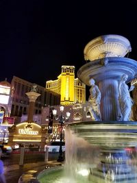 Illuminated building at night