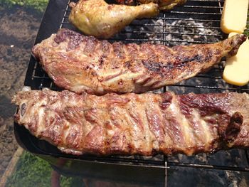 Close-up of meat on barbecue grill