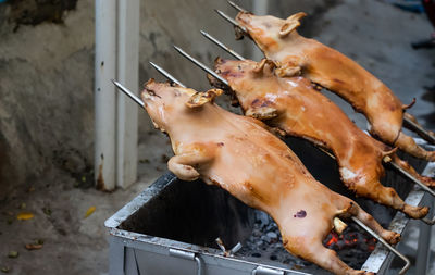 High angle view of meat on barbecue grill