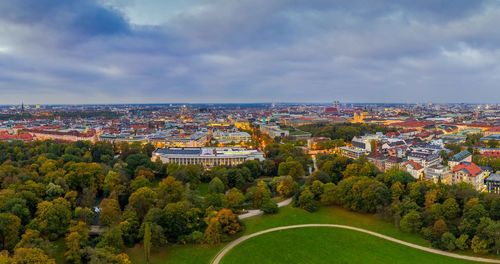 High angle view of trees and buildings against sky