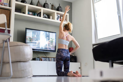 Woman standing at home