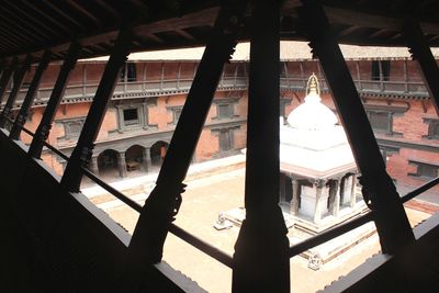 View of historical building through window