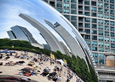 Group of people on modern buildings in city