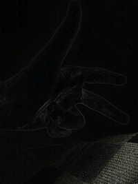 High angle view of shoes on table against black background