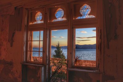 View of sea through window