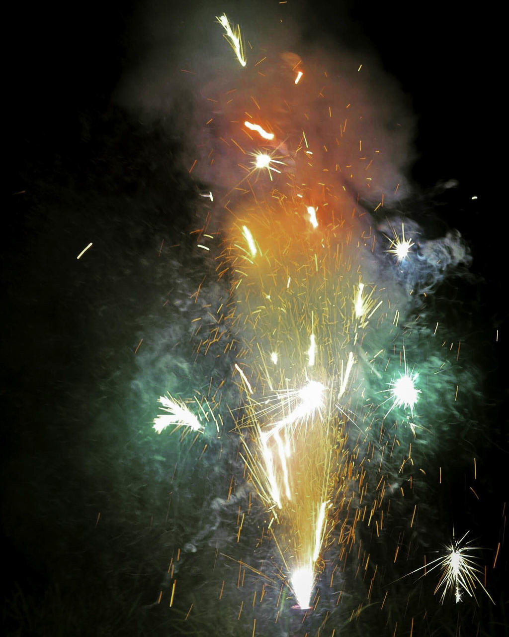 LOW ANGLE VIEW OF FIREWORK DISPLAY