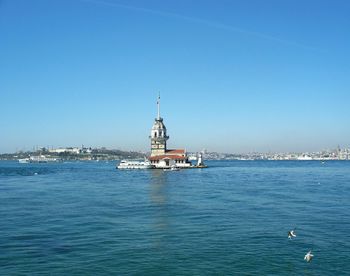 View of sea against blue sky