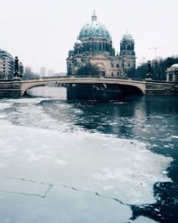 View of cathedral in city against sky