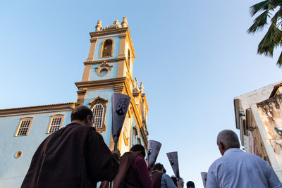 Catholics are seen climbing the pelourinho hill during the easter week procession