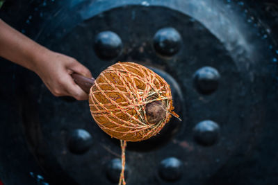 Close-up of hand holding drumstick