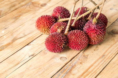 High angle view of strawberries on table