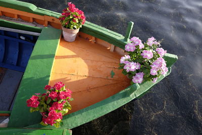 High angle view of potted plant in boat on river