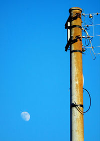 Low angle view of smoke stack against sky