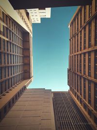 Low angle view of buildings against clear sky