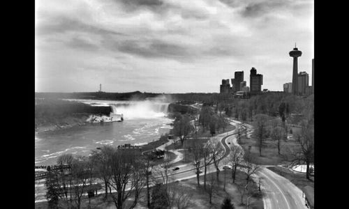 View of city against cloudy sky