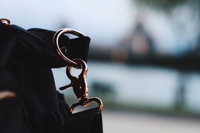 Close-up of chain hanging on metal