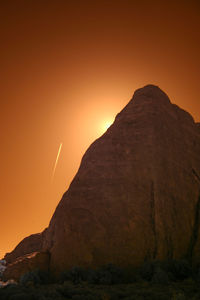 Scenic view of mountains against sky during sunset