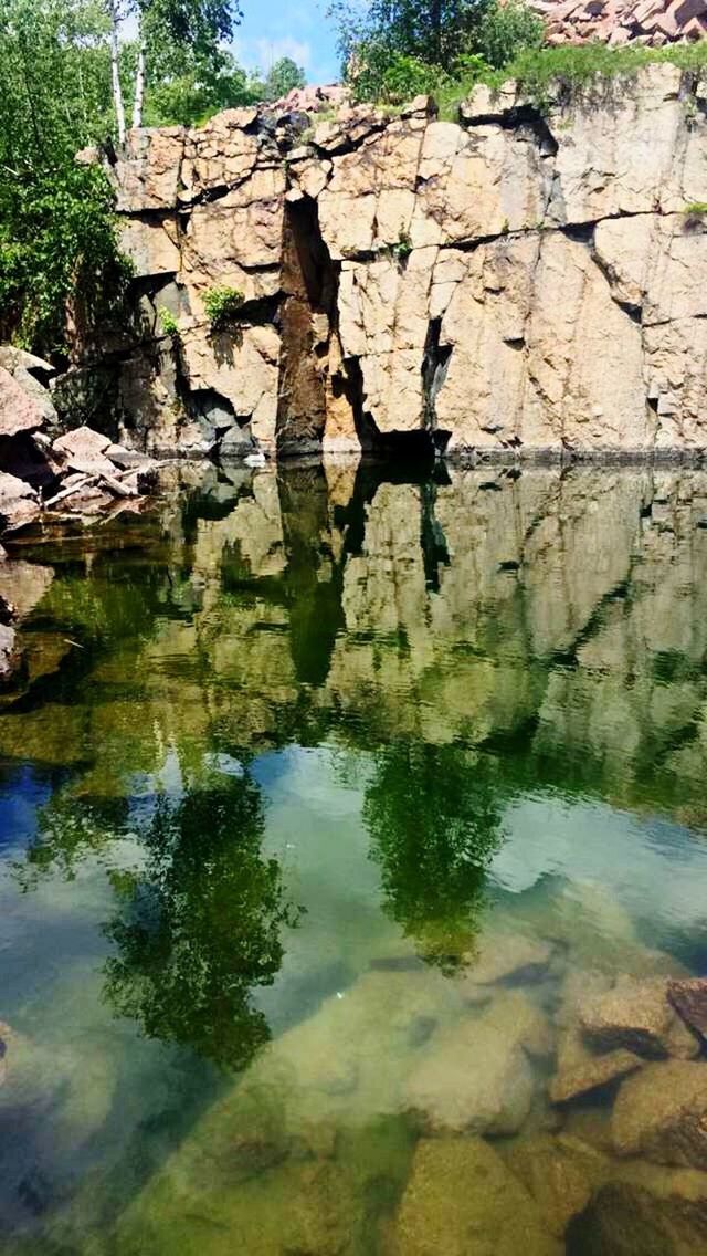 water, reflection, rock - object, tranquility, nature, waterfront, lake, beauty in nature, tranquil scene, scenics, river, rock, rock formation, day, stream, outdoors, no people, stone, stone - object, standing water