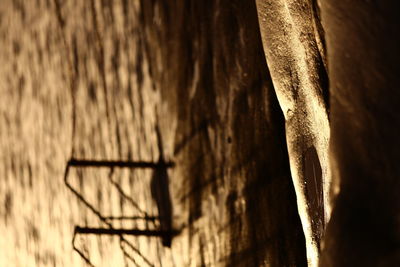 Close-up of wood against wall