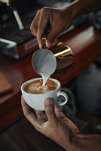 Man holding coffee cup