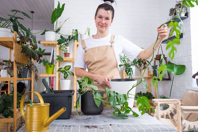 Portrait of senior woman preparing food at home