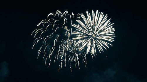 Low angle view of firework display