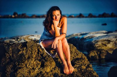 Beautiful young woman in sea